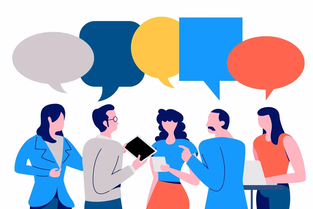 business-colleagues-have-a-discussion-with-speech-bubbles-free-vector.webp